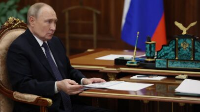 Putin signs law prohibiting adoption of Russian children by citizens