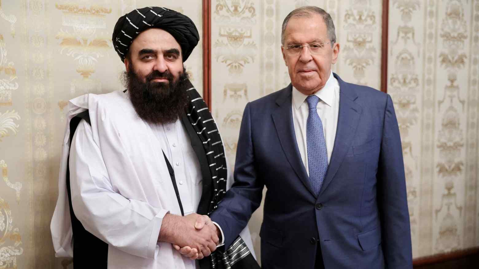 isw russia moves closer delisting taliban terrorist organizations afghanistan's acting foreign minister amir khan muttaqi (left) meets russian counterpart sergei lavrov (right) moscow 4 2024 left shakes hands establishes legal