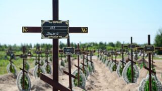 Ukraine's police name Russian commander suspected of murder of woman