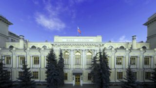 Russia halts dollar purchases as ruble hits lowest level since