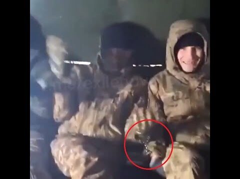 Russians Handcuffed Together On the Way to the Front So