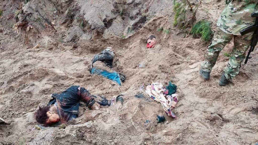 A mass grave with corpses of Ukrainian civilians found after the liberation of Bucha from Russian occupation.