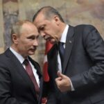 President of Turkey, Erdogan whispers into Russian Dictator Putin's ear