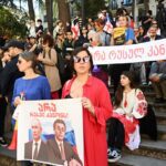 Georgians head out to vote in parliamentary elections, tensions run high at some polling stations