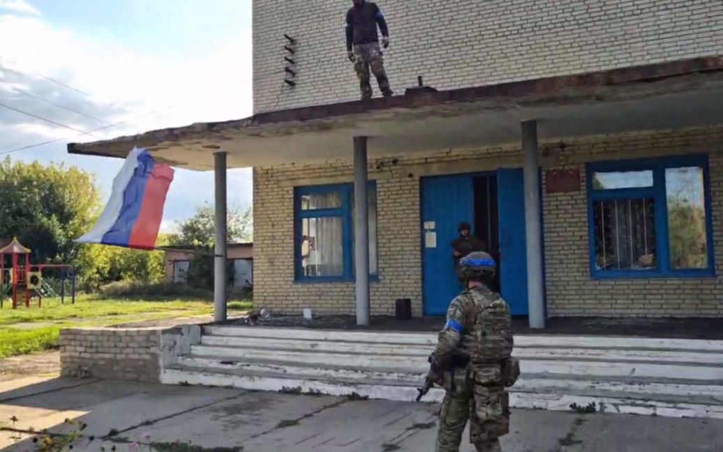 telegraph putin throws young cannon fodder kursk maintains offensive ukraine ukrainian soldiers taking down russian flag vnezapnoe village oblast screenshot from video tsn