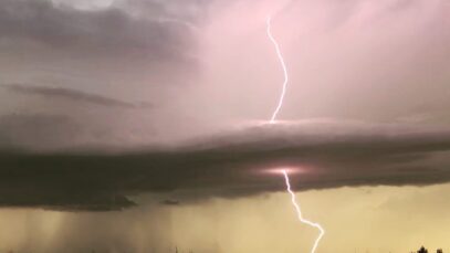 I caught a lightning strike happening over Minot AFB.