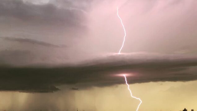 I caught a lightning strike happening over Minot AFB.