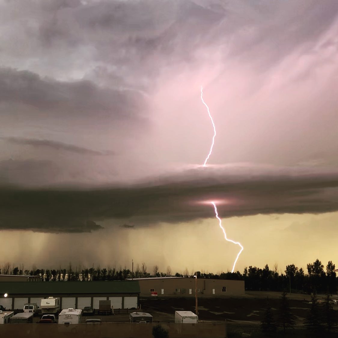 I caught a lightning strike happening over Minot AFB.