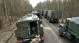 A column of military personnel from Chechnya.  Somewhere in the forests of Ukrai...