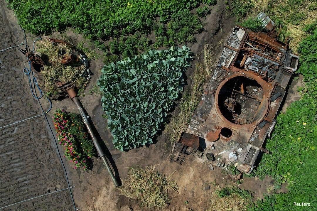 Realities in Ukraine these days. A woman planted cabbages around a destroyed rus