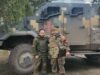Soldiers of the “Sparta” battalion (DPR) with a captured Ukrainian