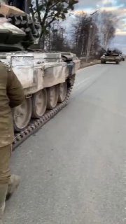 Kharkov region.  our tanks and the locals.  Ukrainian police do not interfere...