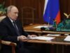 Putin signs law prohibiting adoption of Russian children by citizens