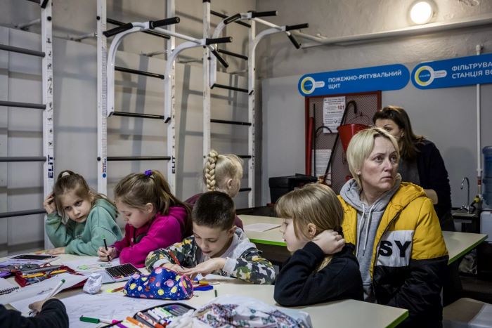 Ukrainian teachers teach children in school