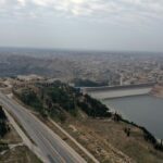 Syrian government forces withdraw from Homs, cutting Assad off from key Russian military base