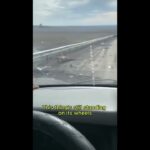 Russian Drives Down a Graveyard of Wrecked Vehicles in Kursk, Before Being Hit by a Drone